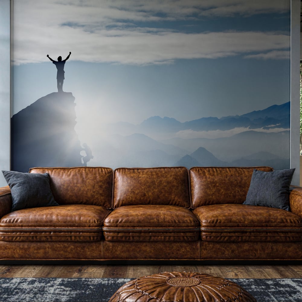 Wall Mural - Bergsteiger auf einem Gipfel im Gebirge bei Nebel - Scandiwall